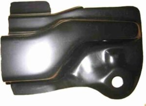 A black metal part with some brown lines on it