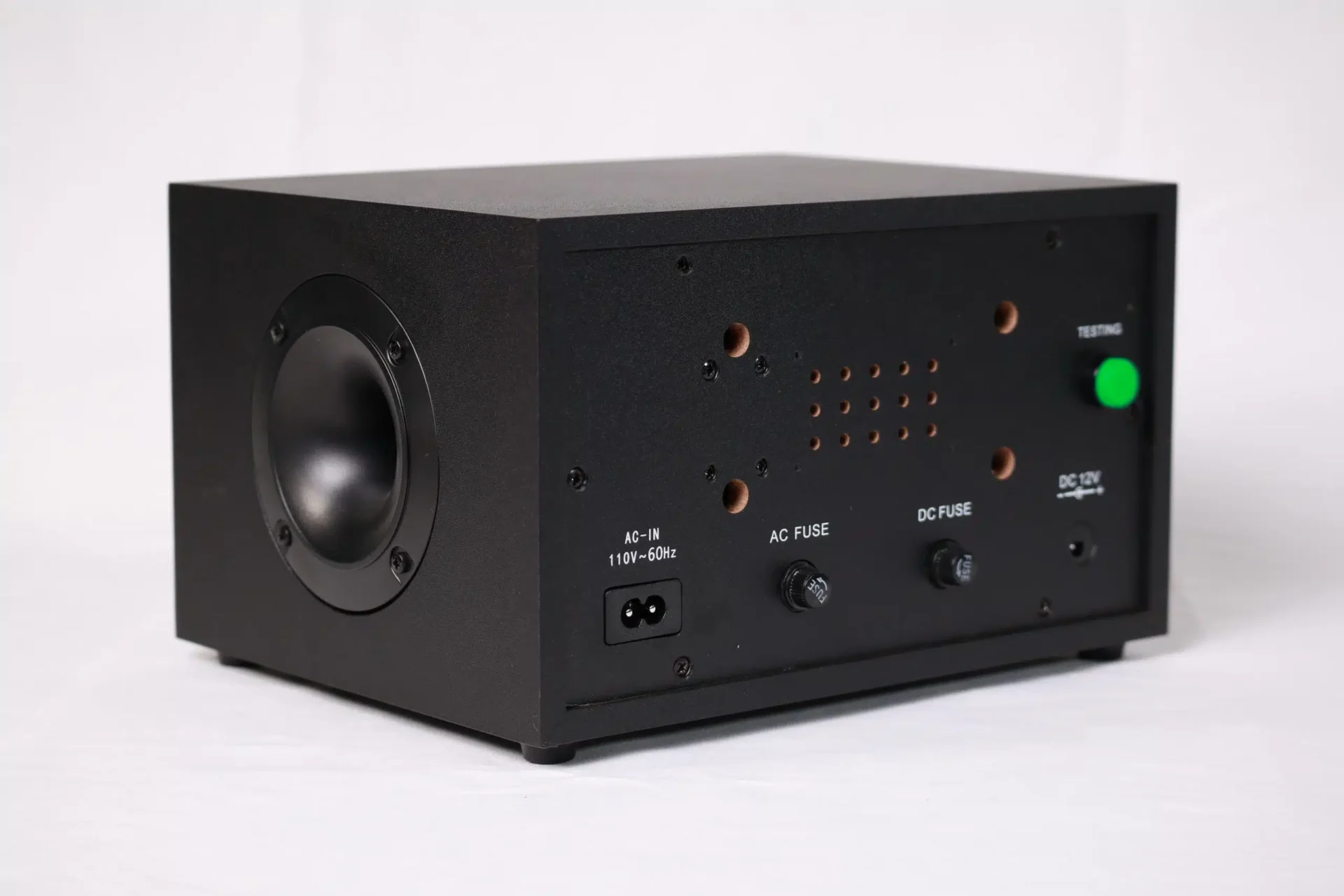 A black box with an alarm button on the side.